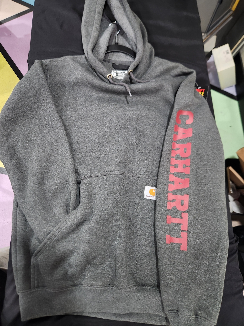Carhartt Men's Gray Hooded Sweatshirt with Red Sleeve Logo